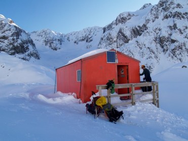 Arriving at Barkers Hut and cracking through to water supply